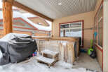 Enjoy the luxury of this property with a private hot tub, perfect for relaxing after a long day.