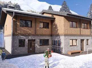 This stunning chalet offers a perfect blend of modern design and alpine charm.