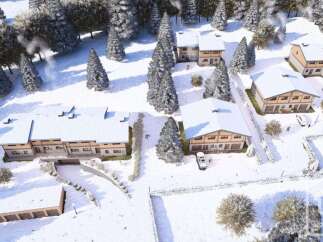 Discover your dream alpine retreat! This stunning property boasts multiple chalets nestled in a picturesque, snow-covered landscape.