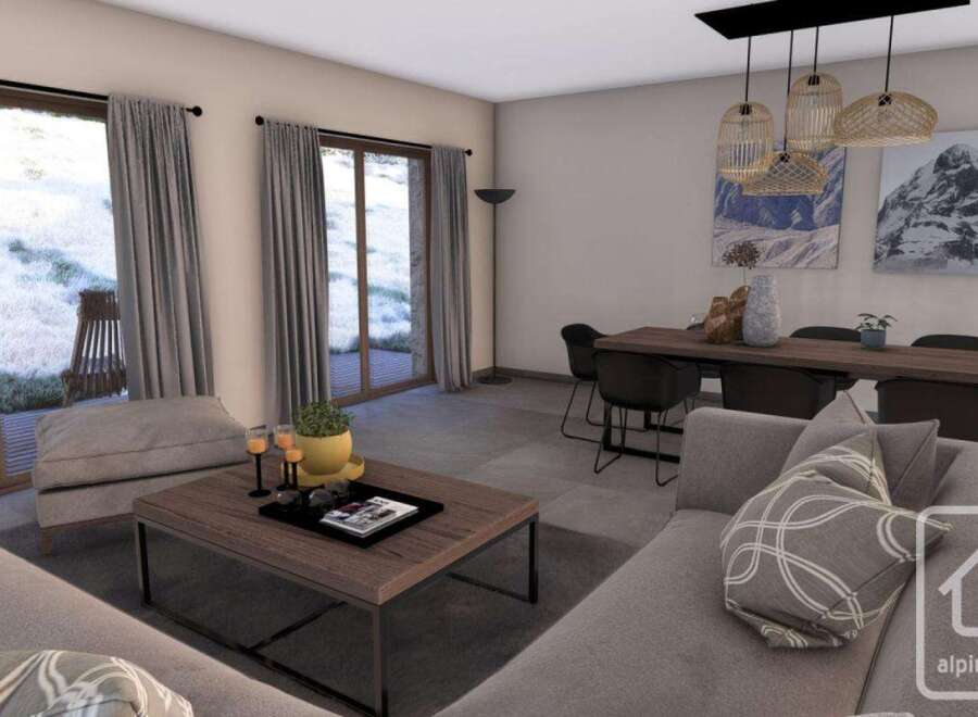 Experience modern living in this stunning property, featuring a spacious living area with a cozy sofa and a stylish coffee table.