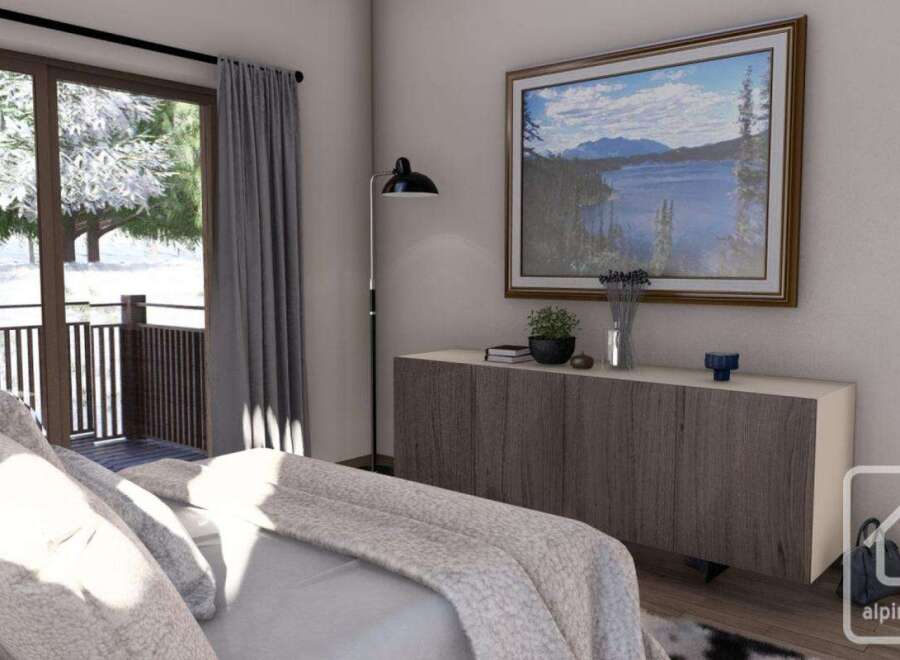 Experience the tranquility of this stunning bedroom, featuring a picturesque view of a snowy landscape through large windows.