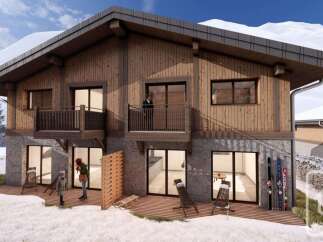 Discover the charm of this stunning chalet nestled in a picturesque snowy landscape.