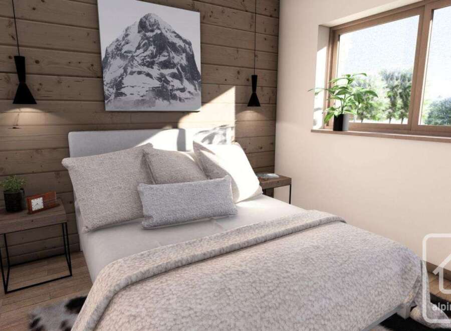 This cozy bedroom features a stunning mountain-themed artwork, adding a touch of nature to the space.