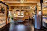 Step into rustic elegance with this stunning property, featuring warm wooden interiors and a cozy ambiance.