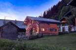 Discover the charm of this stunning wooden chalet nestled in a serene mountain setting.