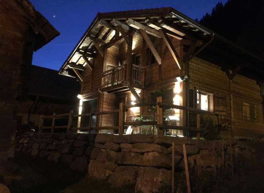 Experience the charm of this stunning wooden chalet nestled in a serene location.