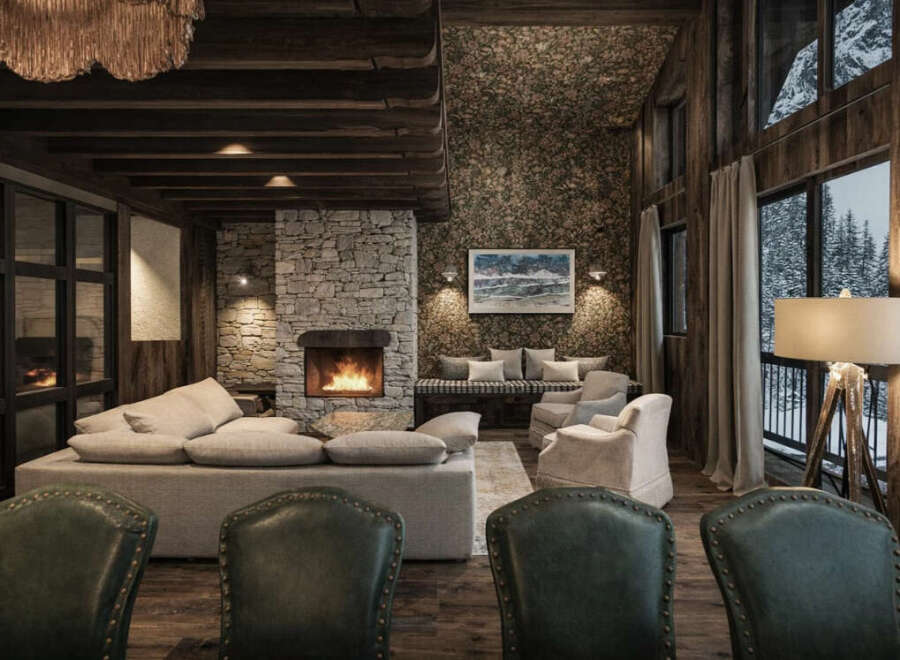 Experience the epitome of luxury living in this stunning property, featuring a cozy fireplace and a spacious seating area perfect for relaxation.