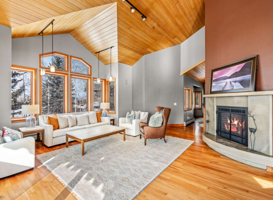 Experience luxury living in this stunning property featuring a cozy fireplace, perfect for chilly evenings.