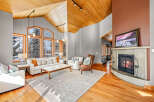 Experience luxury living in this stunning property featuring a cozy fireplace, perfect for chilly evenings.