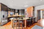 This stunning kitchen boasts a spacious island with seating, perfect for entertaining.