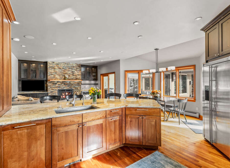 This stunning kitchen boasts a spacious layout with a large island, perfect for entertaining.