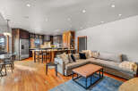 Step into luxury with this stunning open-concept living space! Featuring a gourmet kitchen with stainless steel appliances and a spacious island, perfect for entertaining.