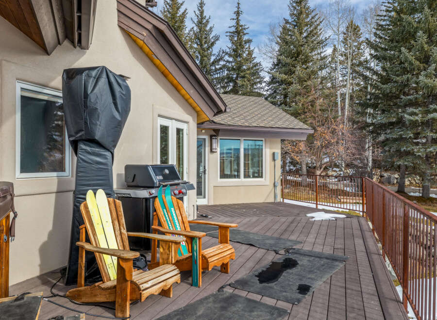 Enjoy outdoor living at its finest with this stunning property featuring a spacious deck, perfect for entertaining or relaxing.