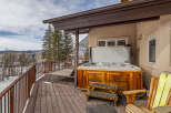 Enjoy the ultimate relaxation in this stunning property featuring a luxurious hot tub on a spacious deck.