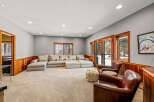 This stunning living room boasts a spacious layout, perfect for entertaining or relaxing.