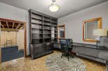 This home office boasts a stylish and functional design, perfect for productivity.