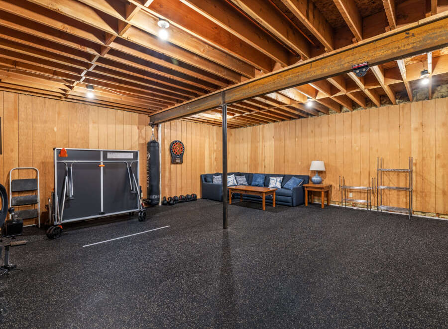 This versatile space offers endless possibilities, perfect for a home gym, entertainment area, or additional living space.