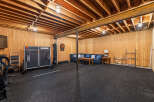 This versatile space offers endless possibilities, perfect for a home gym, entertainment area, or additional living space.