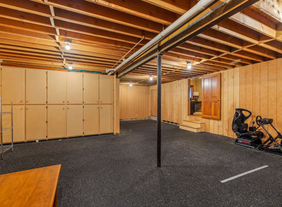 Discover the potential of this versatile space! This unfinished basement offers a blank canvas for your dream recreation room, home gym, or storage solution.