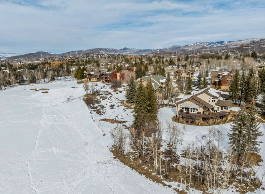Nestled in a picturesque mountain landscape, this stunning property offers a serene retreat.