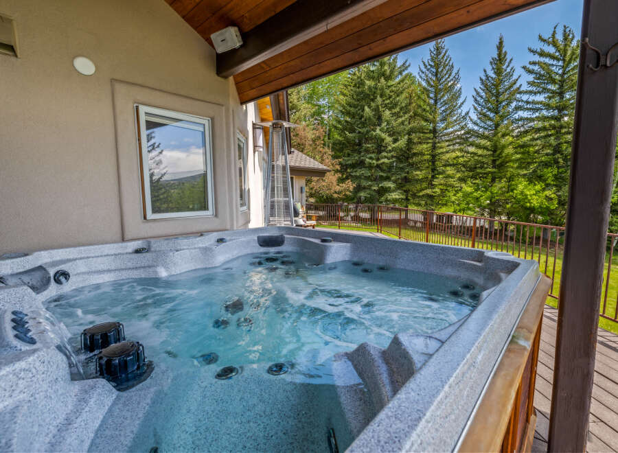 Indulge in ultimate relaxation with this luxurious hot tub, perfect for unwinding after a long day.