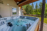 Indulge in ultimate relaxation with this luxurious hot tub, perfect for unwinding after a long day.