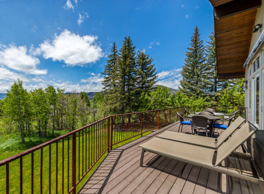 Enjoy breathtaking mountain views from this expansive deck, perfect for outdoor entertaining or quiet relaxation.