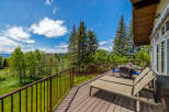 Enjoy breathtaking mountain views from this expansive deck, perfect for outdoor entertaining or quiet relaxation.