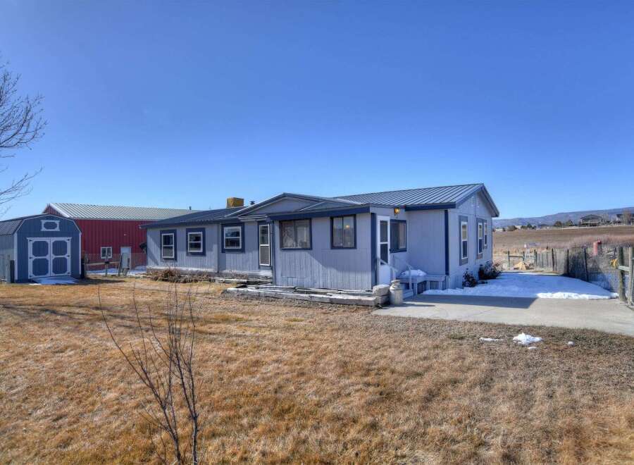 Discover this charming property featuring a cozy home and a spacious lot.