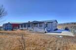 Discover this charming property featuring a cozy home and a spacious lot.