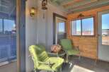 Step into the charm of this inviting porch, perfect for enjoying the outdoors.