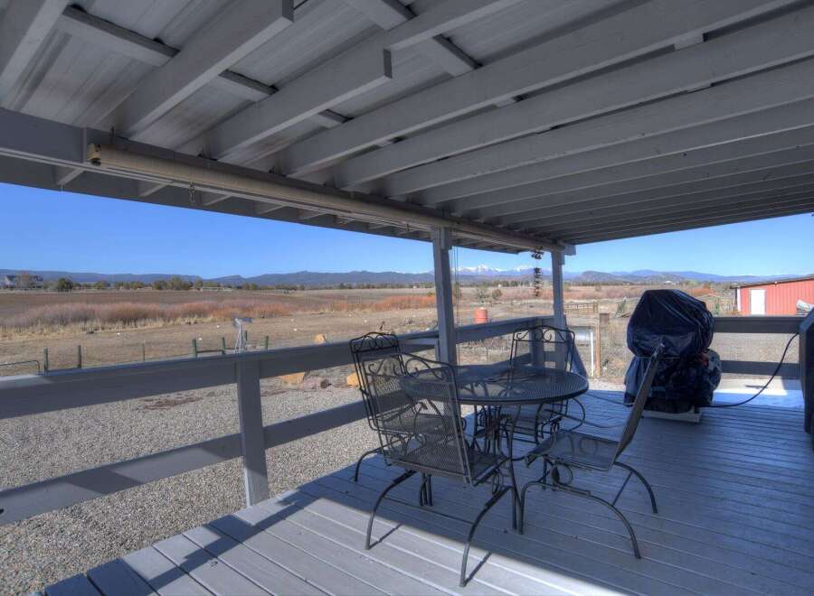 Enjoy breathtaking views from this charming outdoor space.