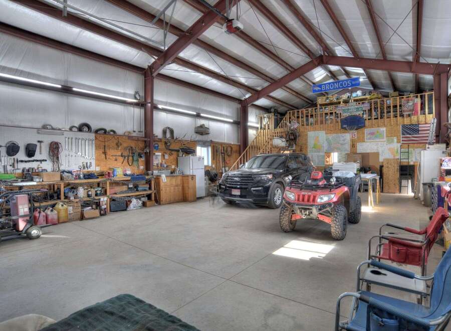 This spacious workshop offers ample room for projects and storage.