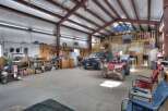 This spacious workshop offers ample room for projects and storage.