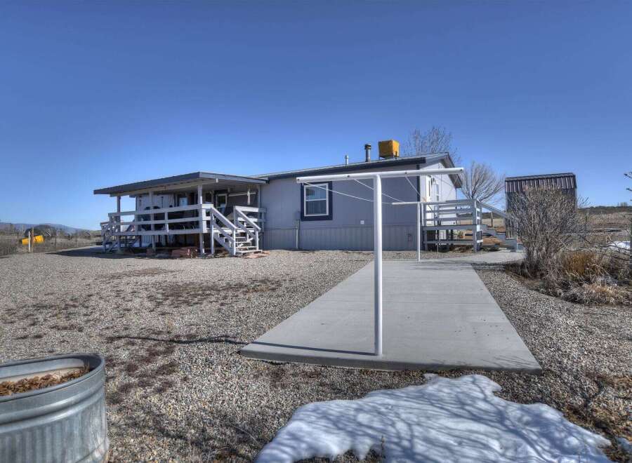 Discover the charm of this property, featuring a spacious layout and a welcoming exterior.
