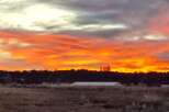 Witness breathtaking sunsets over your future property! This stunning image showcases the vibrant sky, hinting at the peaceful evenings you can enjoy.