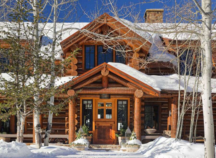 This stunning log cabin home is the perfect mountain retreat, offering a cozy and inviting atmosphere.