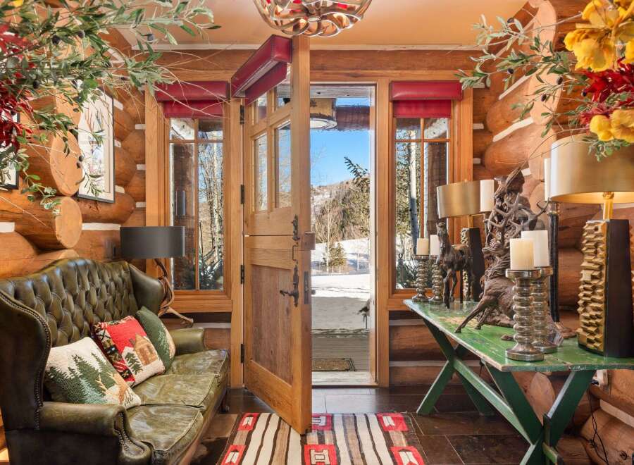 Step into rustic elegance with this stunning log cabin interior.