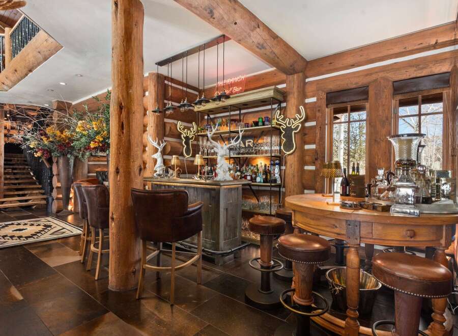 Step into luxury with this stunning bar area, perfect for entertaining.
