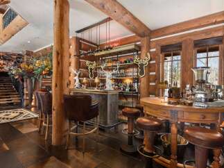 Step into luxury with this stunning bar area, perfect for entertaining.