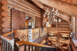Step into rustic elegance with this stunning log cabin interior.