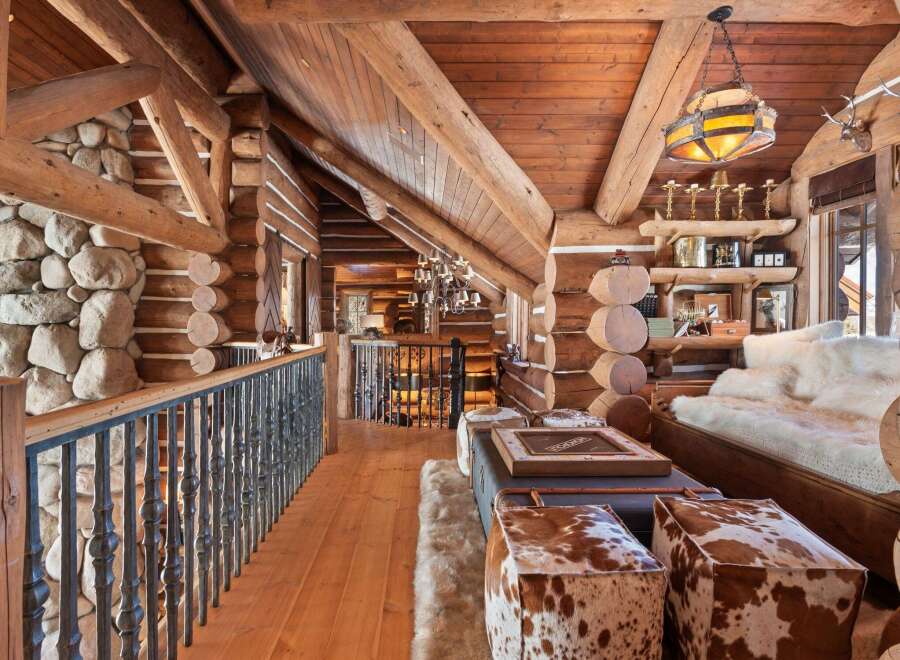 Step into rustic luxury with this stunning log cabin interior.