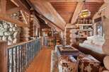 Step into rustic luxury with this stunning log cabin interior.