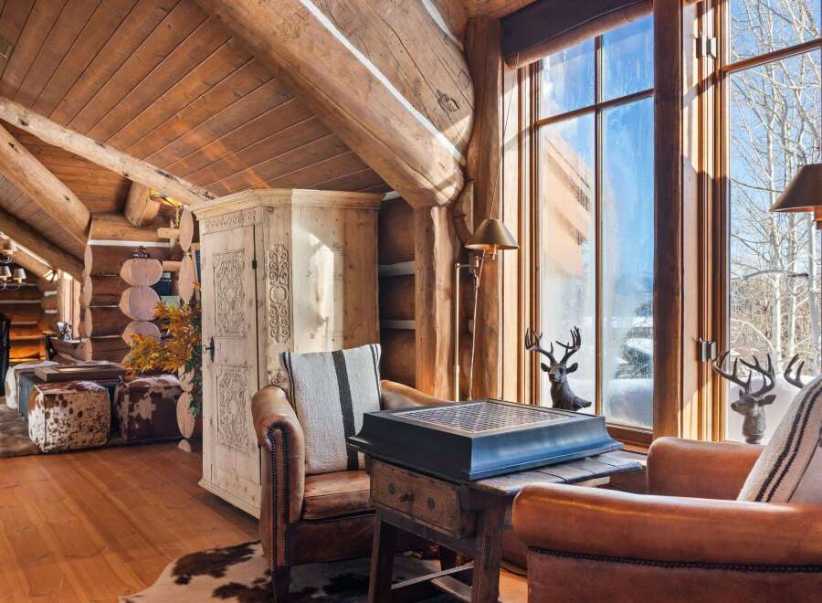 Step into rustic elegance with this stunning log cabin retreat.