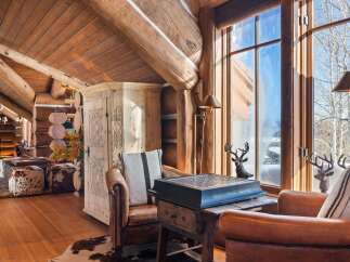 Step into rustic elegance with this stunning log cabin retreat.