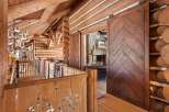 Step into rustic elegance with this stunning log cabin interior.