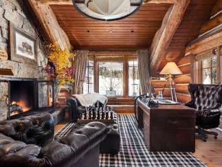 Step into rustic luxury with this stunning cabin retreat.
