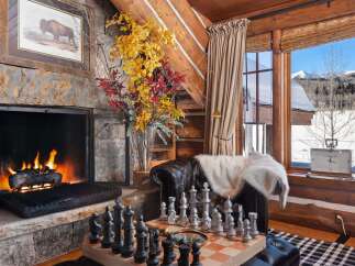 Experience the epitome of rustic luxury in this stunning cabin retreat.