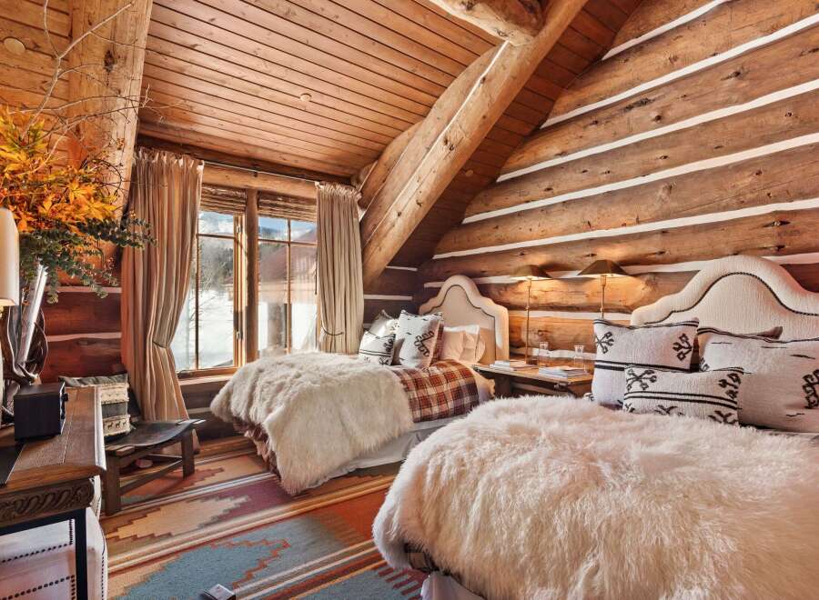 Step into rustic luxury in this stunning bedroom.