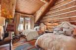 Step into rustic luxury in this stunning bedroom.
